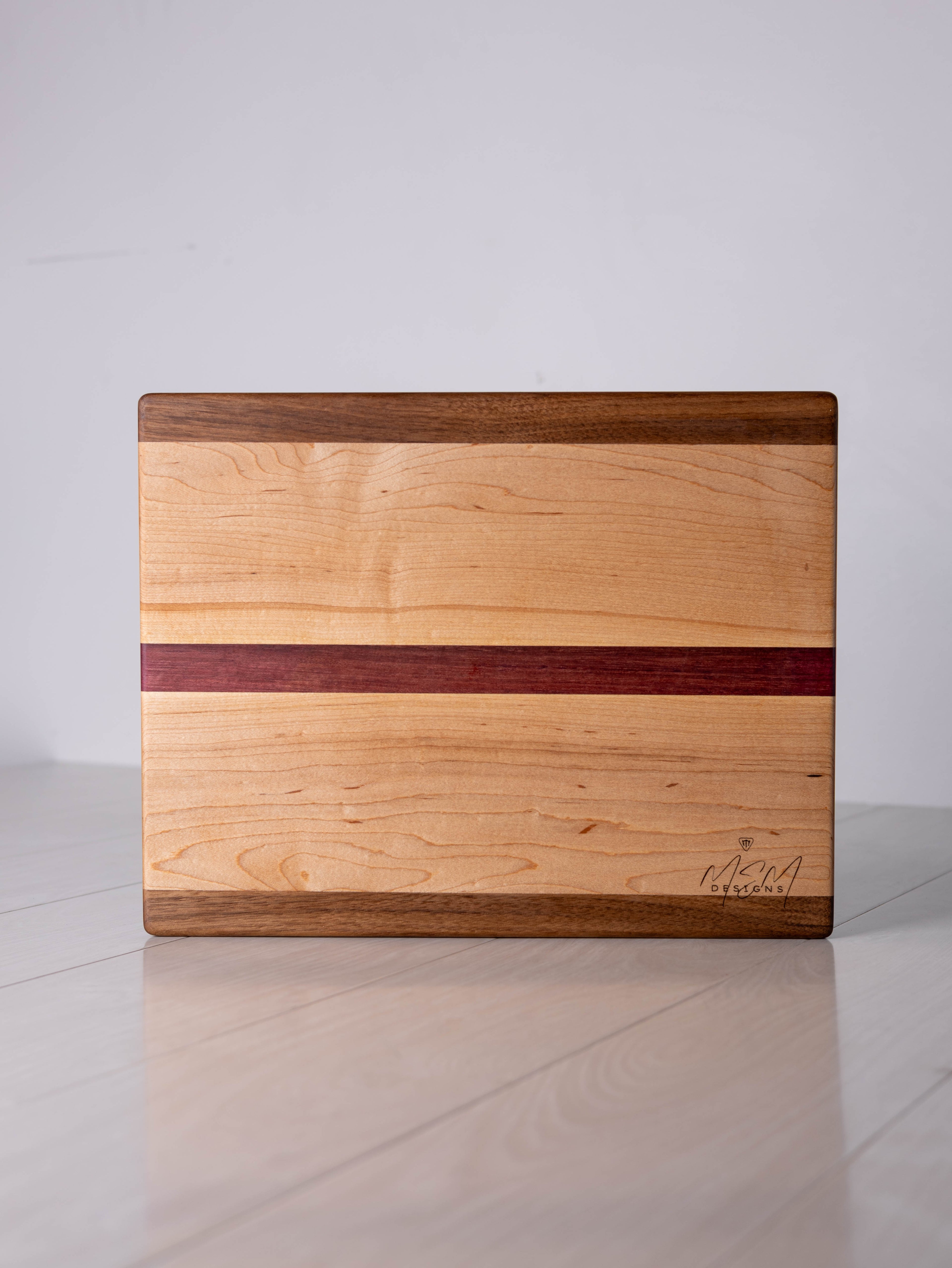 Mahogany/ Maple/ Purple Heart w/ mahogany inlay Cutting Board