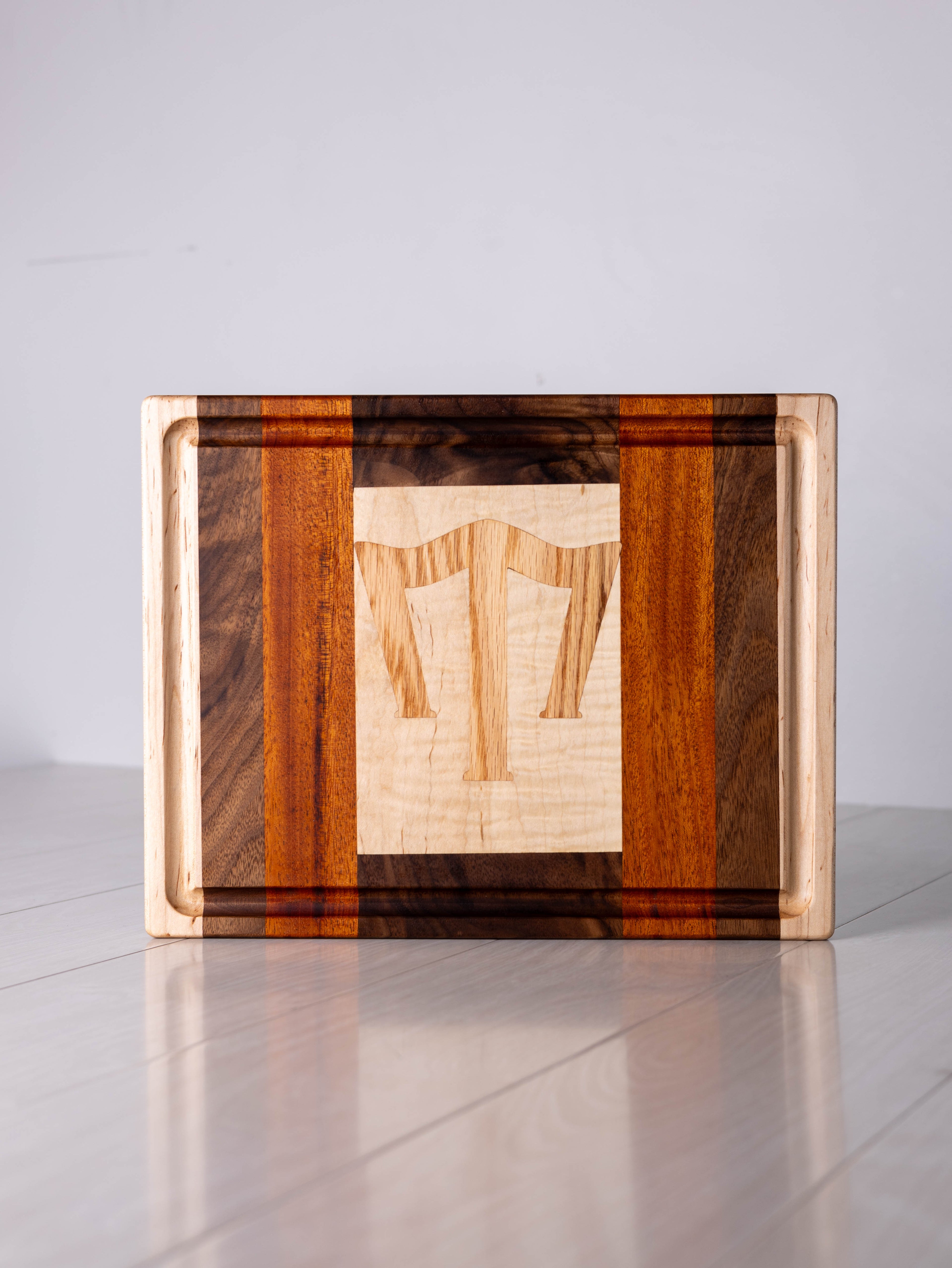 Maple/Walnut/Mahogany w/ Red Oak inlay Cutting Board